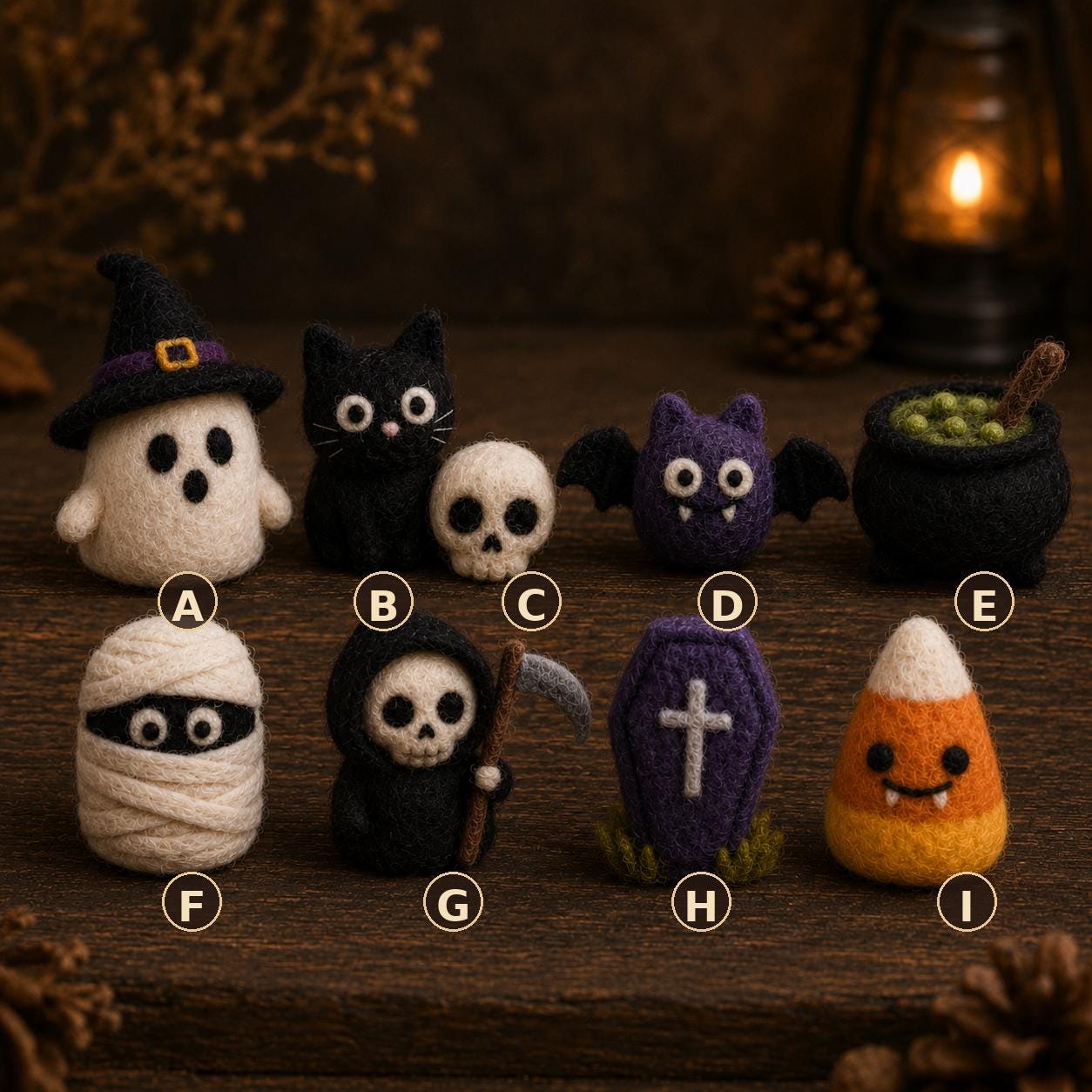 Set A–I: witch ghost, black cat, skull, purple bat, cauldron, mummy, grim reaper, purple coffin, candy corn