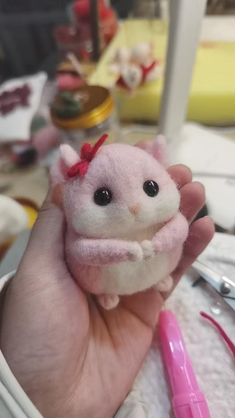 Handmade wool needle felt mouse figurine with detailed features, perfect as a decorative miniature or gift for mom.