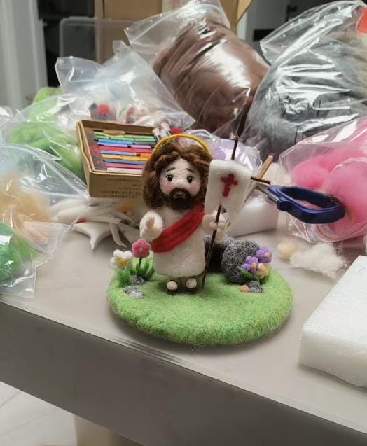 Handmade needle felted Jesus sculpture from Jiajia Felt Studio, Christian faith decor featuring a detailed religious figurine.