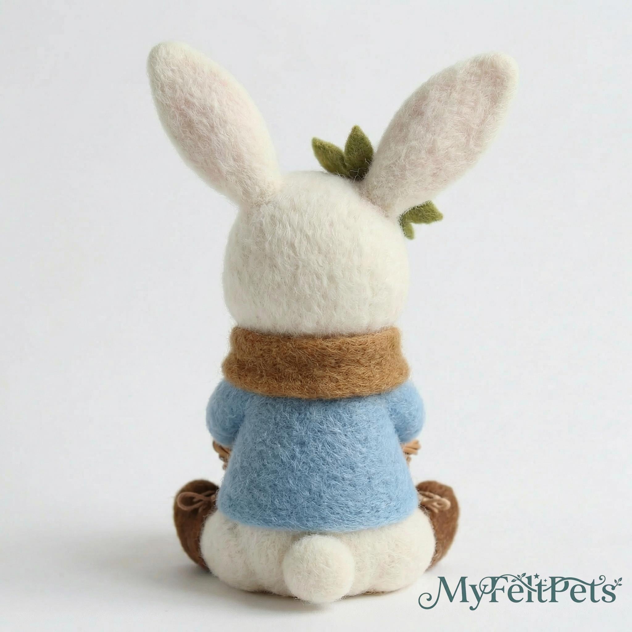 Needle felted bunny figurine from Jiajia Felt Studio, whimsical woodland decor with detailed, colorful animal art.