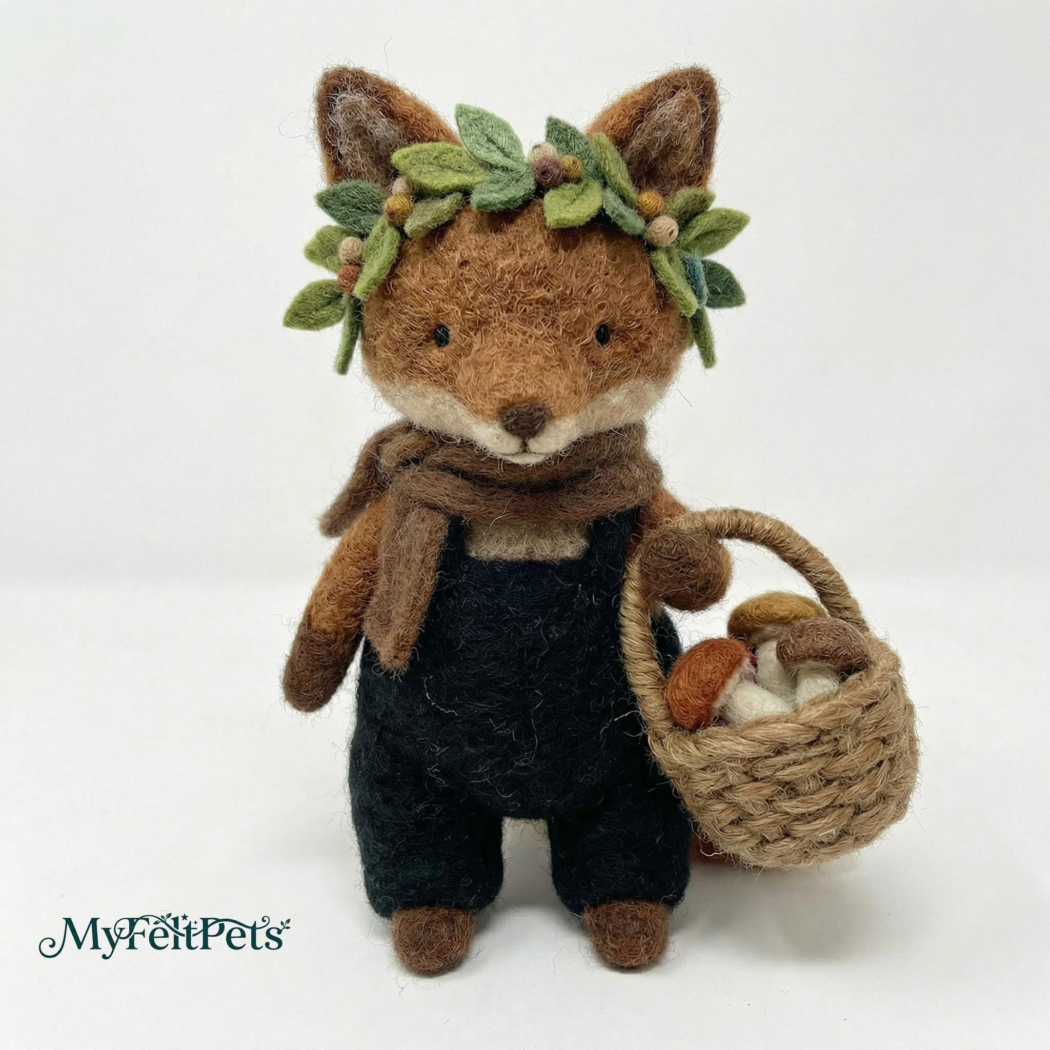 Needle felted fox sculpture ¨C side angle showing handcrafted wool texture and details.