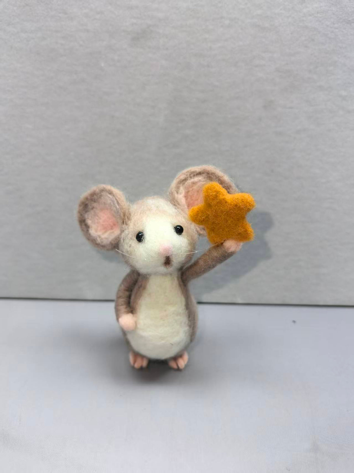 Real studio photo: needle felted mouse holding up a gold star (Style C)