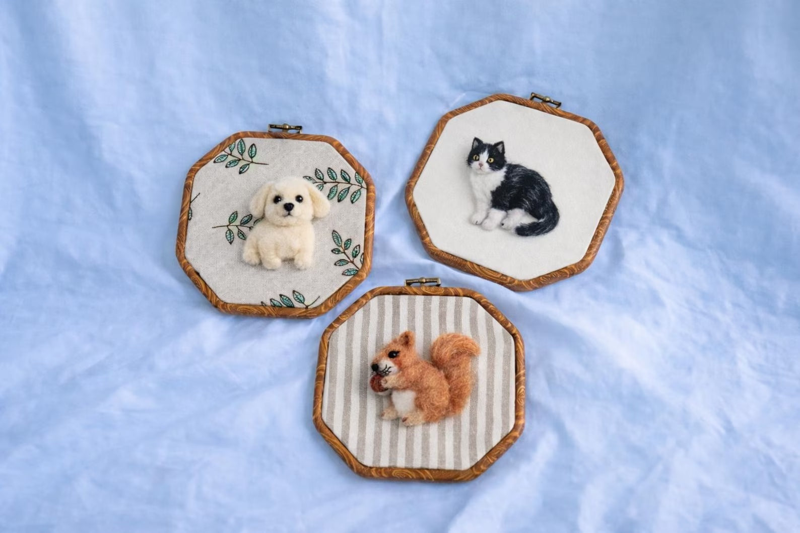 Personalized flat wool felt pet portrait hoops featuring dog cat and squirrel examples for custom handmade gifts