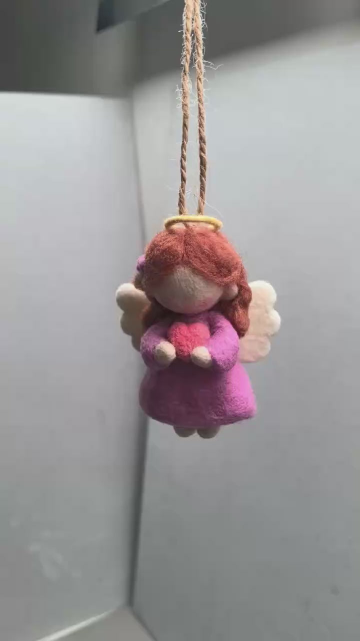 360-degree turntable view of a needle felted angel ornament